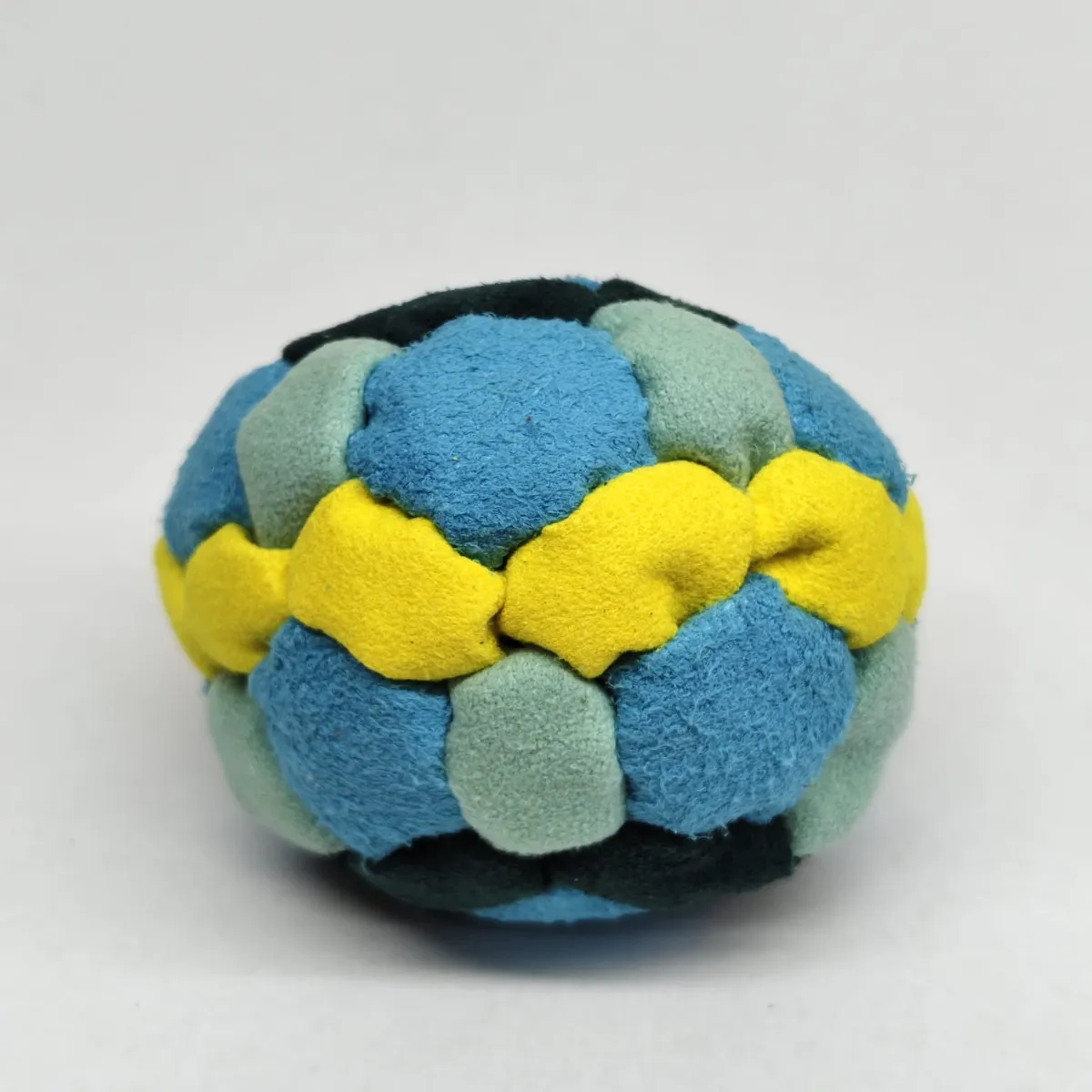 Four Color 42 Panel Footbag FBG-1034 in sky blue, sage, dark green and yellow synthetic suede