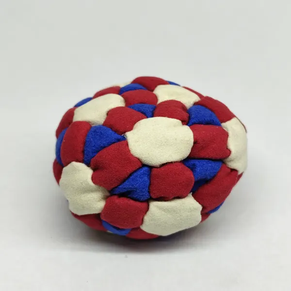 Three Color 62 Panel Footbag FBG-1032 in red, cream and blue synthetic suede, view 2