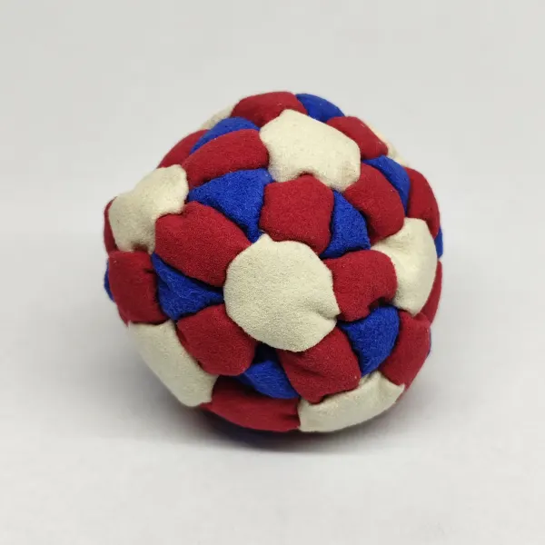 Three Color 62 Panel Footbag FBG-1032 in red, cream and blue synthetic suede