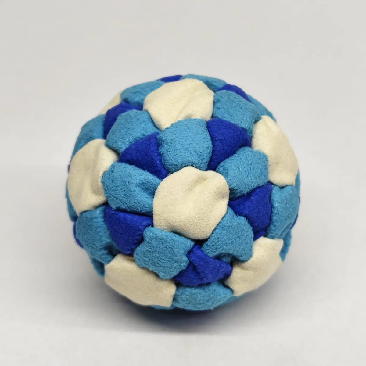 Three Color 62 Panel Footbag FBG-1033 in sky blue, royal blue and cream synthetic suede