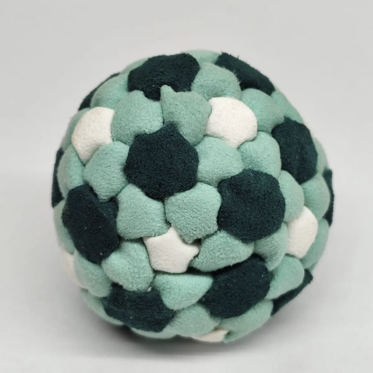 Three Color 92 Panel Footbag FBG-1030 in mint, dark green and white synthetic suede