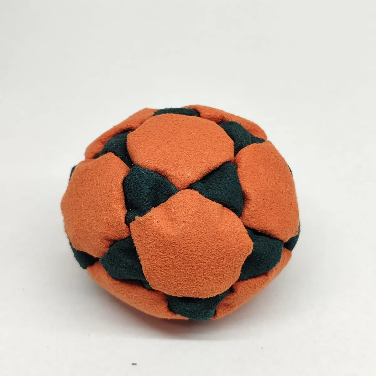 Two Color Star Style 32 Panel Footbag FBG-1039 in orange and dark green synthetic suede